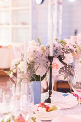 Table set for holiday, event, party or wedding reception in indoor restaurant