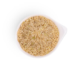 Heap of brown rice in bowl on white background,topview