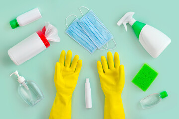 Group of cleaning and disinfection products on blue background.