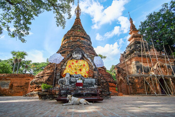 Naklejka premium Buddha statue in old temple in Inwa (Ava) near Mandalay in Myanmar (Burma). Southeast Asia travel concepts