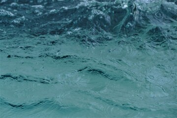 Deep blue sea surface with waves background