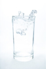 Drink water pouring in to glass