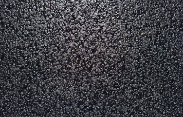 Texture of fresh and new black asphalt. Background of new asphalt