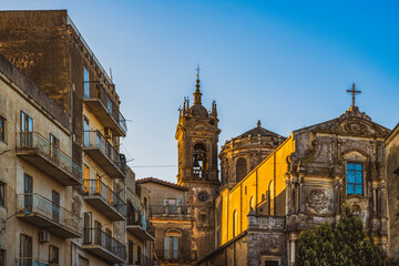 Cityscape and view of the church of Santa Maria del Monte and church San Francesco d'Assisi at sunrise in sicilian ceramic city Caltagirone in Sicily, south Italy