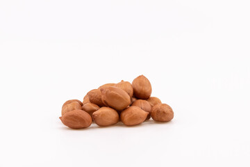 Heap made of fresh peanuts isolated on white background