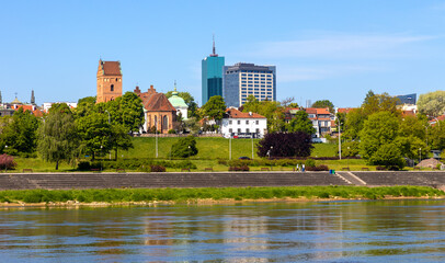 Panoramic view of New Town quarter - Nowe Miasto - and Muranow district with Wybrzerze Gdanskie embankment at Vistula river in Warsaw, Poland - obrazy, fototapety, plakaty