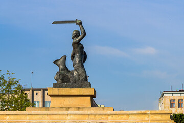 The Warsaw Mermaid called Syrenka on the Vistula River bank in Warsaw, Poland © Ralfik D