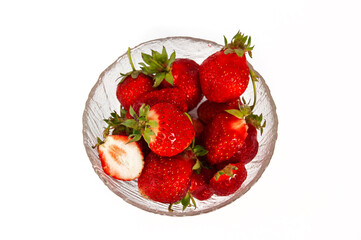 Red tasty strawberries close-up on a white background