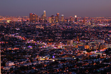 Fototapeta na wymiar Downtown Los Angeles and Hollywood glows at sunset