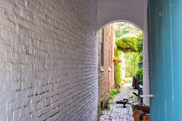 An old vintage colonial walkway between two colonial homes in old NEw castle delaware