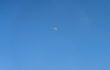 Moon in Blue Sky