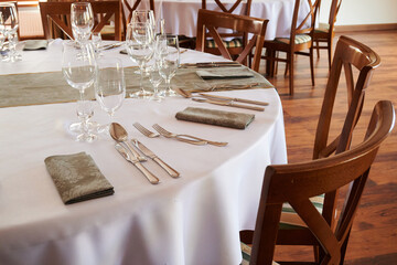 Wedding tables ready to be decorated for the ceremony