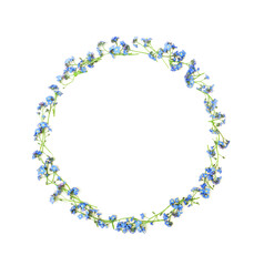 a frame of small blue flowers woven in the shape of a wreath