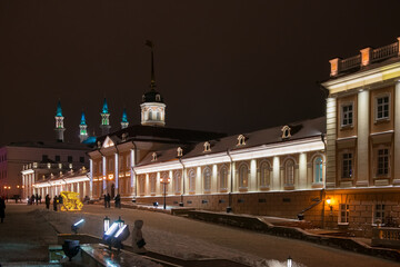 Fototapeta na wymiar KAZAN, RUSSIA - JANUARY 3 2020: Winter evening in Kazan Kremlin. Cannon Yard with night lights. Kazan, Tatarstan, Russia