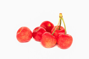 Juicy cherries on an isolated white background close-up