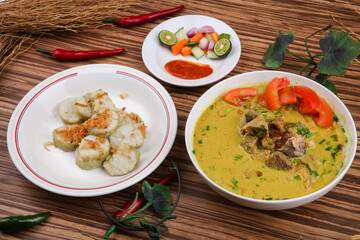 Empal Gentong is a traditional food from Cirebon Indonesia. consisting of meat soup with coconut milk soup.