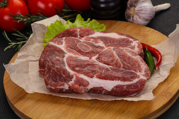 Raw pork neck steak