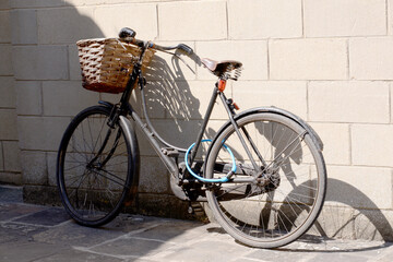 Fototapeta na wymiar Old style black bike with basket