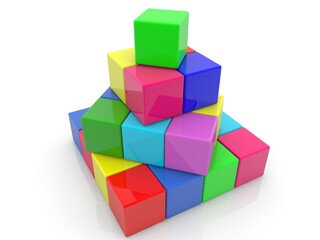 Obraz premium Colored toy blocks assembled in the shape of a pyramid