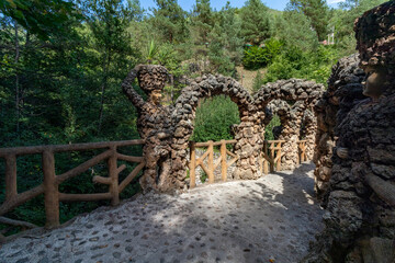 Fototapeta na wymiar In the village of La Pobla de Lillet in Catalonia there is this beautiful garden made by Gaudi with incredible details.
