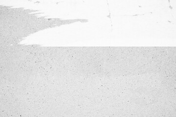 Torn Poster on White Concrete Wall Texture Background.