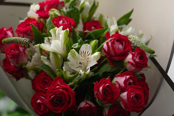 Floristics a bouquet of roses for a holiday