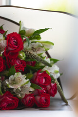 Floristics a bouquet of roses for a holiday