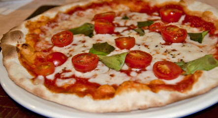 Fresh and delicious pizza with tomato and cheese