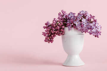 lilac in a white vase