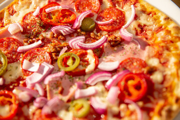 Spicy pizza close up with out of focus elements