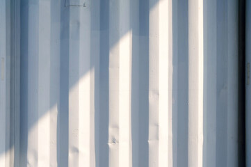 Close up Light Beam on White Surface of Metal Container Background.