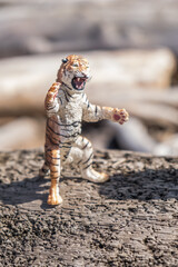 Closeup of tiger figurine in fighting stance