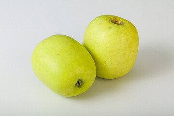 Two ripe green sweet apples