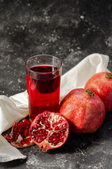 a glass of freshly squeezed pomegranate juice
