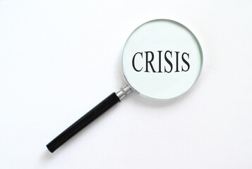 crisis text under a magnifying glass, with isolated background