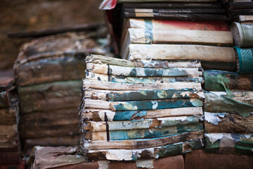 Piles of old books and journals ready for recycling