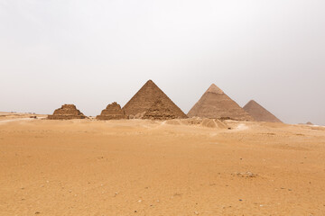 The pyramids of Giza, Menkaure, Khafre, and Khufu