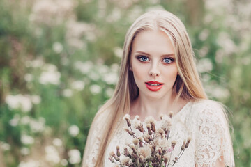 Beautiful caucasian blondie joyful woman natural face casual female outdoor portrait lifestyle beauty girl in park