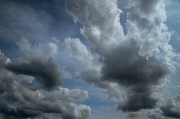 Fototapeta premium Blue sky, high, majestic Cumulus clouds, the Sun.