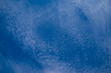 Fototapeta na wymiar Blue sky, high, majestic Cumulus clouds, the Sun.