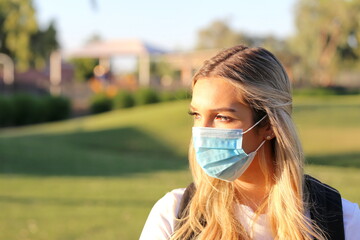 A portrait of a student wearing a face mask.