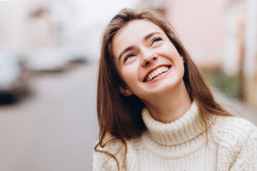 Obraz premium Portrait of beautiful woman natural face smiling joyful casual female portrait lifestyle beauty girl outdoors