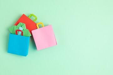 Shopping paper bags. Sesonal sale, online deals, discounts, promotion, shopping addiction concept. Top view