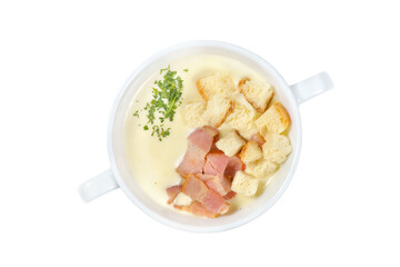 cream soup with bacon and croutons isolated on a white background