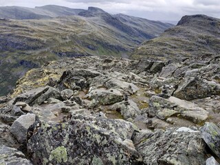 View on Geiranger fjord, rocks and the valley at cloudy weather.