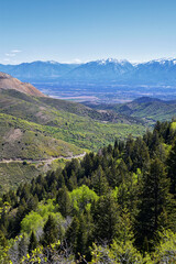 Fototapeta na wymiar Rocky Mountain Wasatch Front peaks, panorama landscape view from Butterfield Canyon Oquirrh range by Rio Tinto Bingham Copper Mine, Great Salt Lake Valley in fall. Utah, United States.