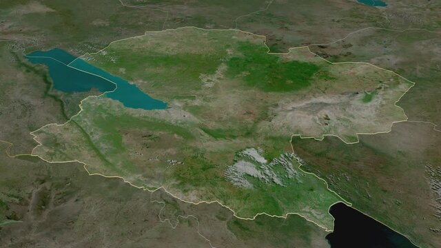 Mbeya, region with its capital, zoomed and extruded on the satellite map of Tanzania in the conformal Stereographic projection. Animation 3D