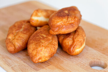 Close-up of deep-fried patties. Homemade bakery. on a wooden table.