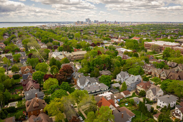 Fototapeta premium Milwaukee, WI / USA - May 30, 2020: Aerial view of Milwaukee, Wisconsin looking south towards downtown Milwaukee from approximately Summit Avenue and Hartford Street in Shorewood Wisconsin