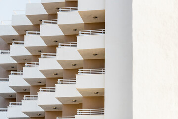 Geometric background of windows and balconies of a building facade. Abstract pattern